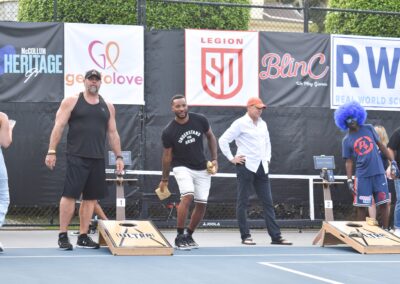 norman powell and others playing cornhole