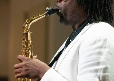 man playing a saxophone